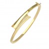 Pulsera rigida oro 18 Ktes adorno cruzado con circonitas