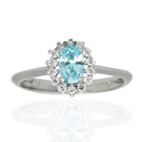 Anillo orla aguamarina y circonitas oro blanco 18Ktes