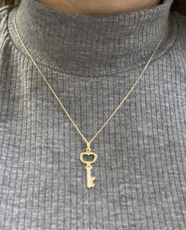 Colgante llave circonitas Oro 18K